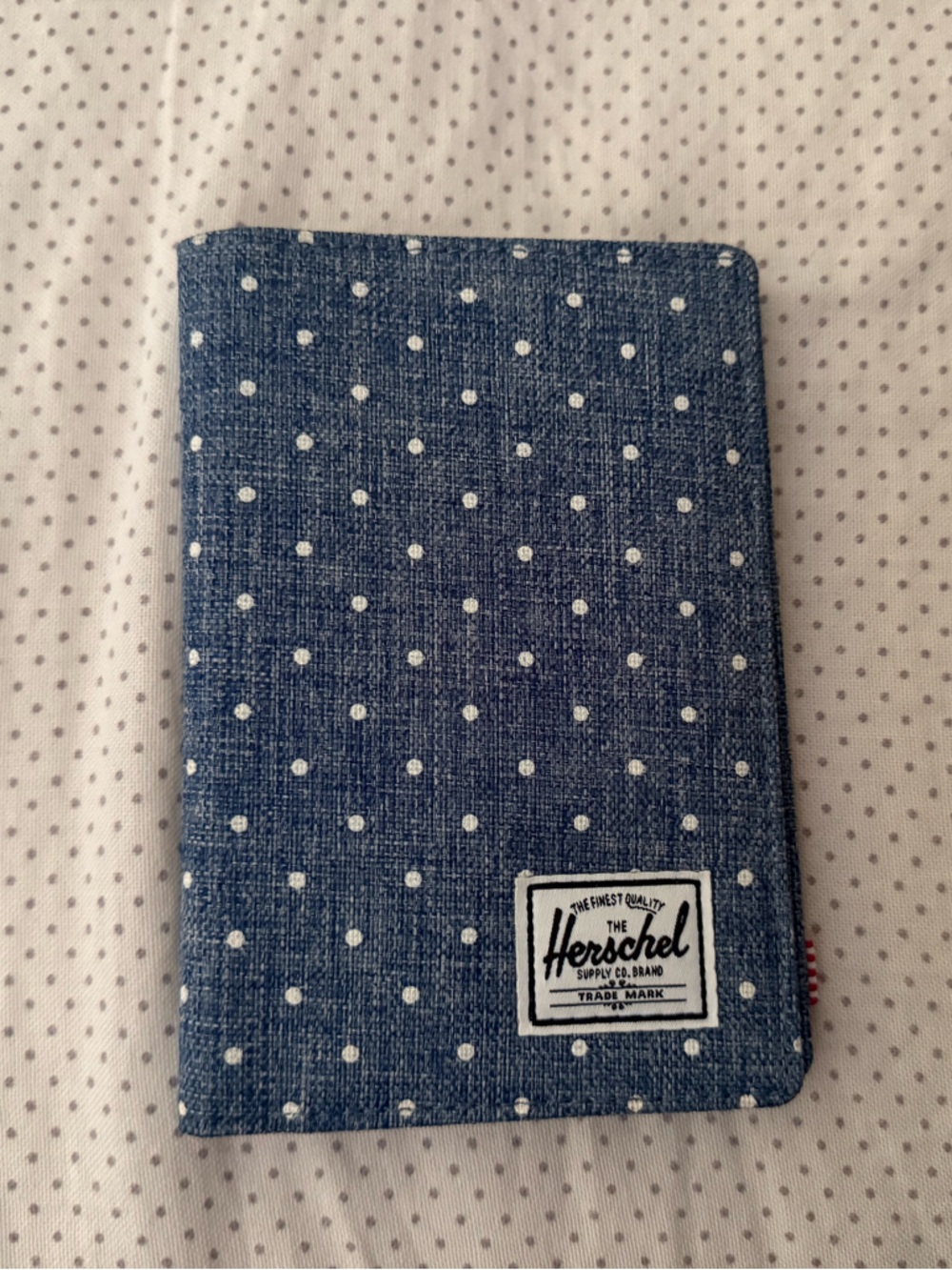 Herschel Blue Polka Dot Passport Wallet with Red Lining